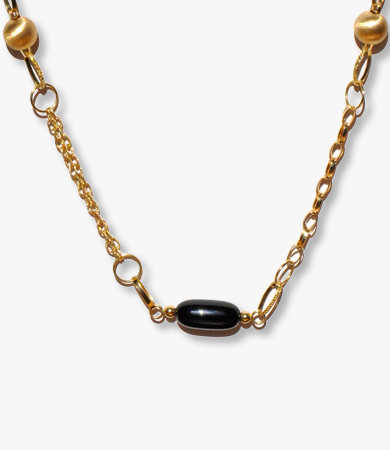 Yellow gold and onyx necklace by Homen | Statement Jewels